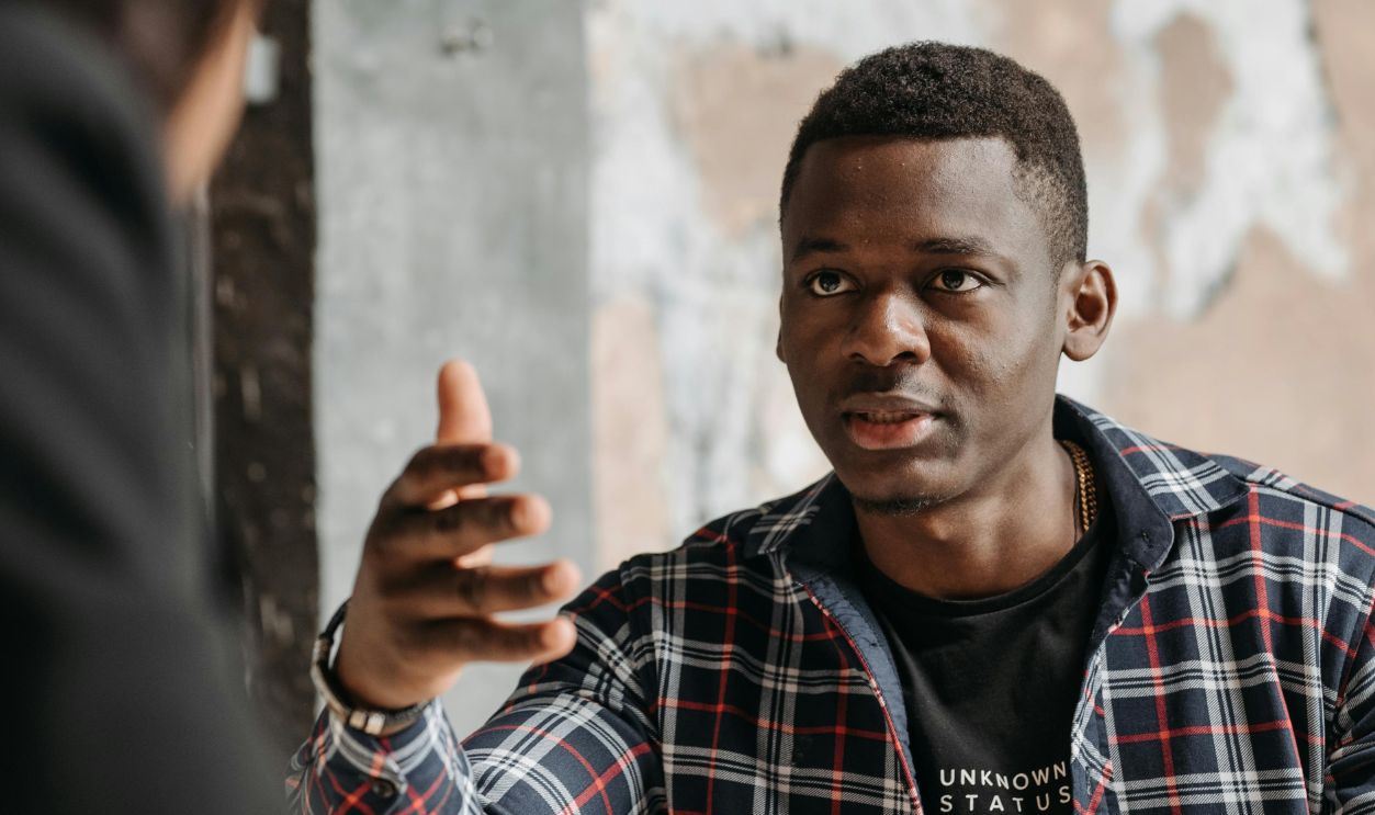 A Man Talking to a Lawyer