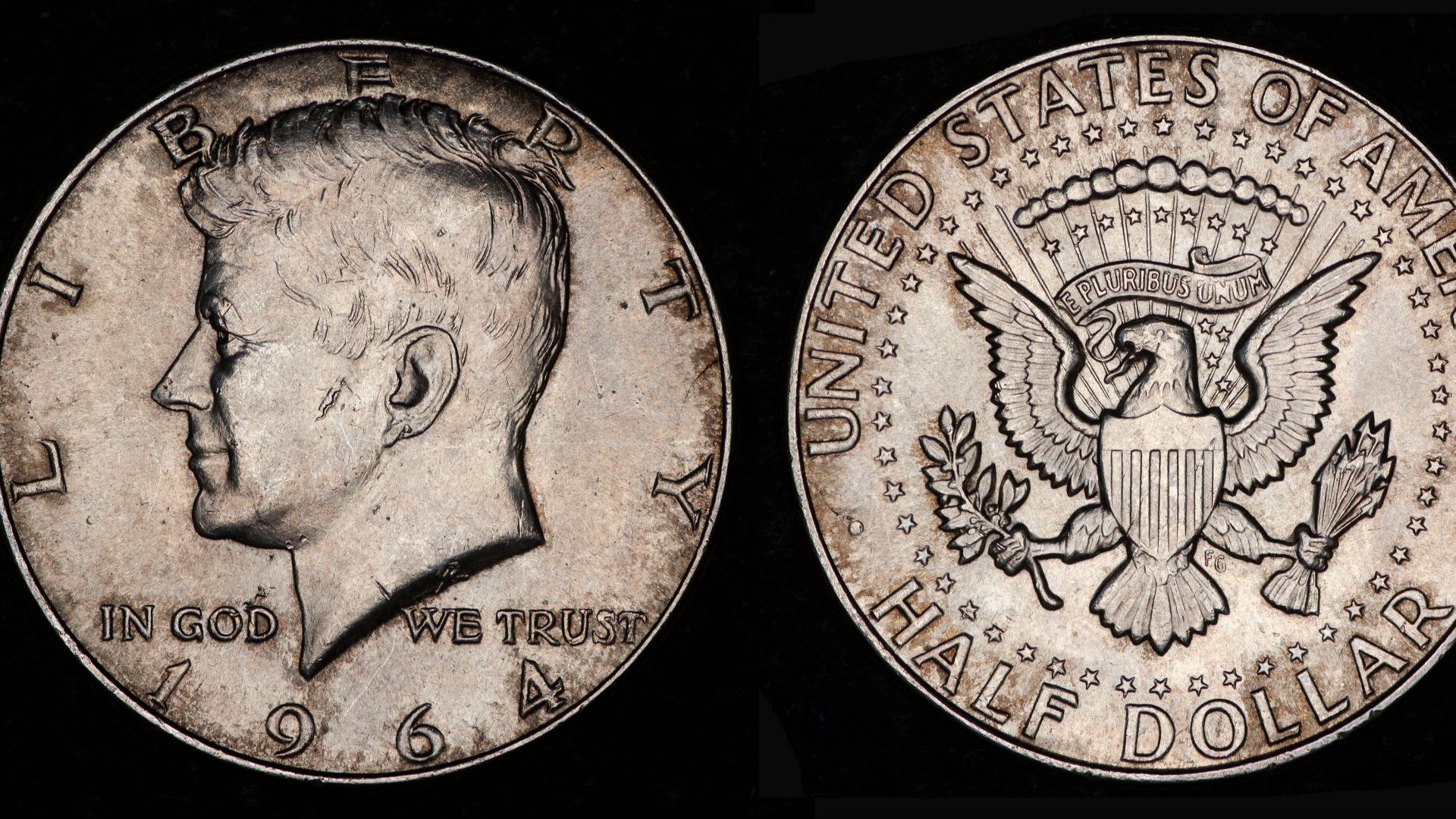 Moneda de medio dólar (medio dólar Kennedy) USA de 1964. Plata 0.900, 30.6 mm de diámetro y 12.5 g de peso. Número de Krause KM# 202