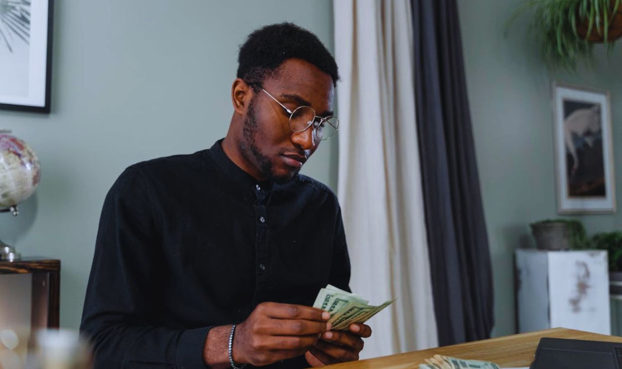 A Man Counting Money