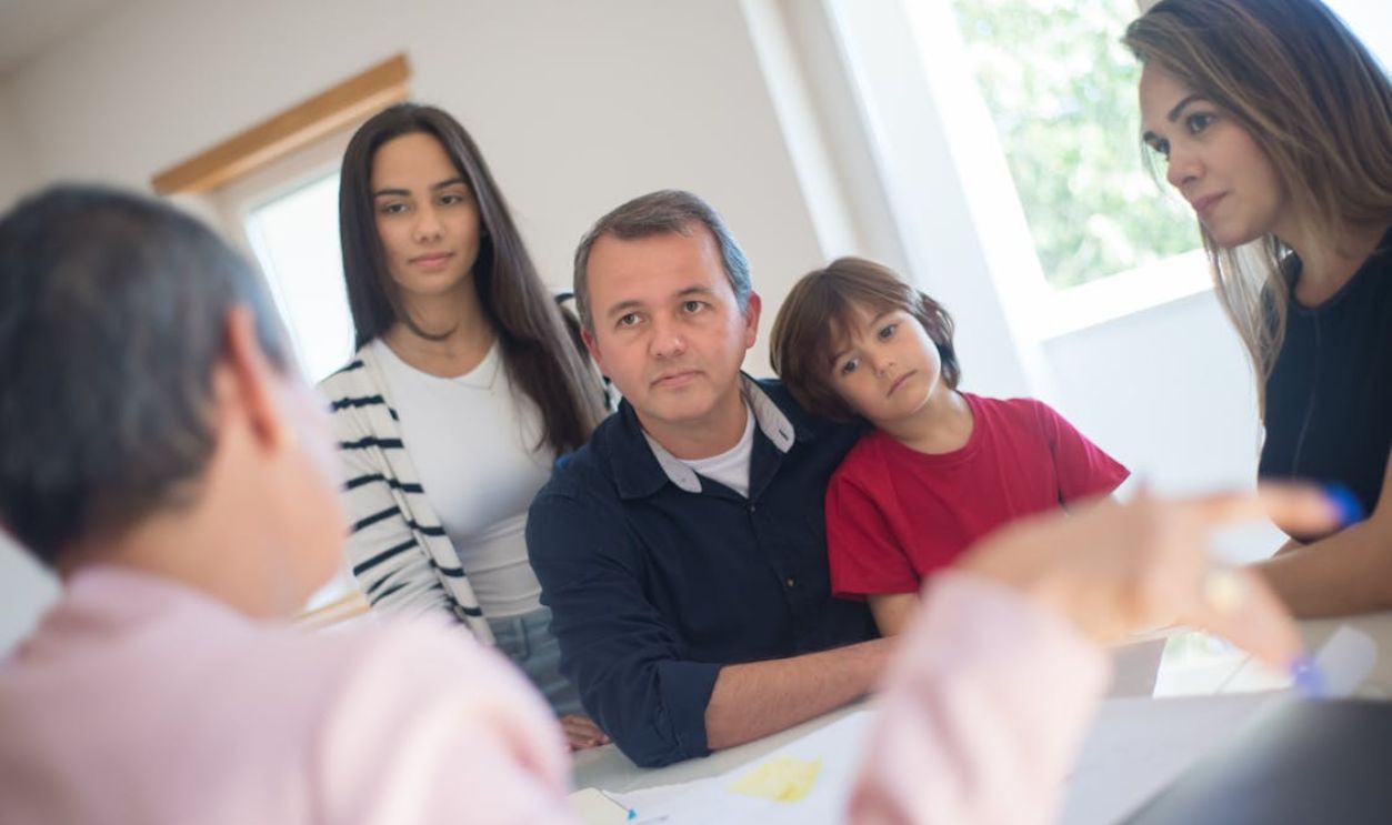 A Family Sitting at the Table