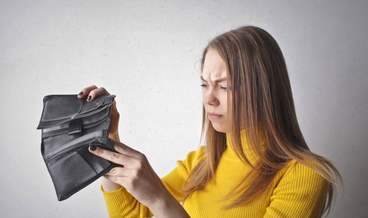 Woman Holding Black Wallet