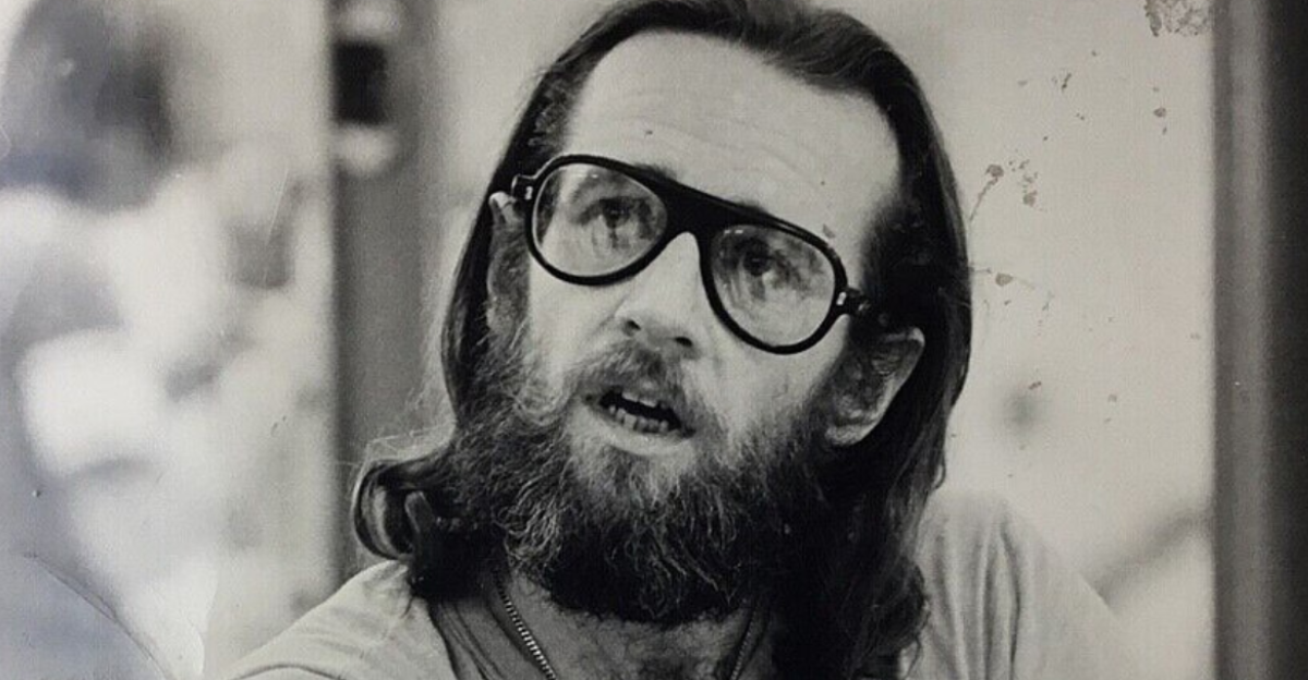 Portrait photograph of George Carlin, c. 1972