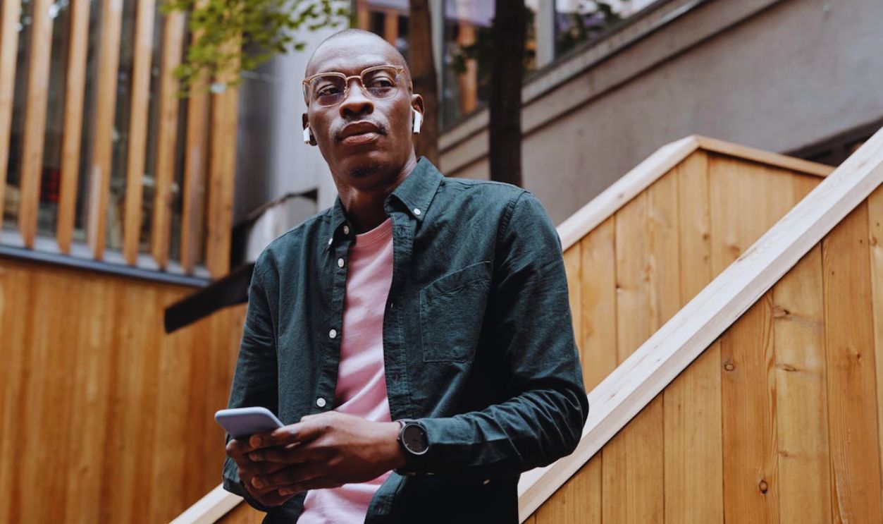 A Man in Black Long Sleeve Button Up Shirt
