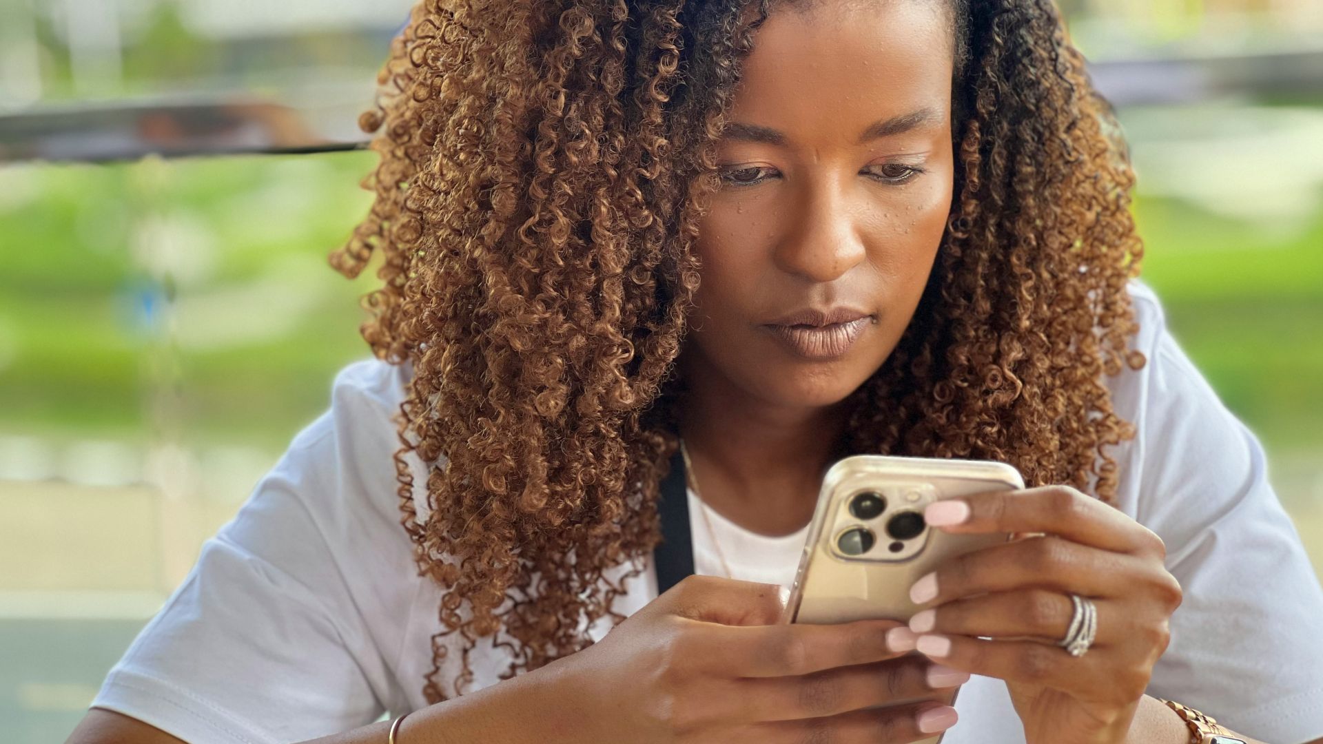 a woman holding a camera