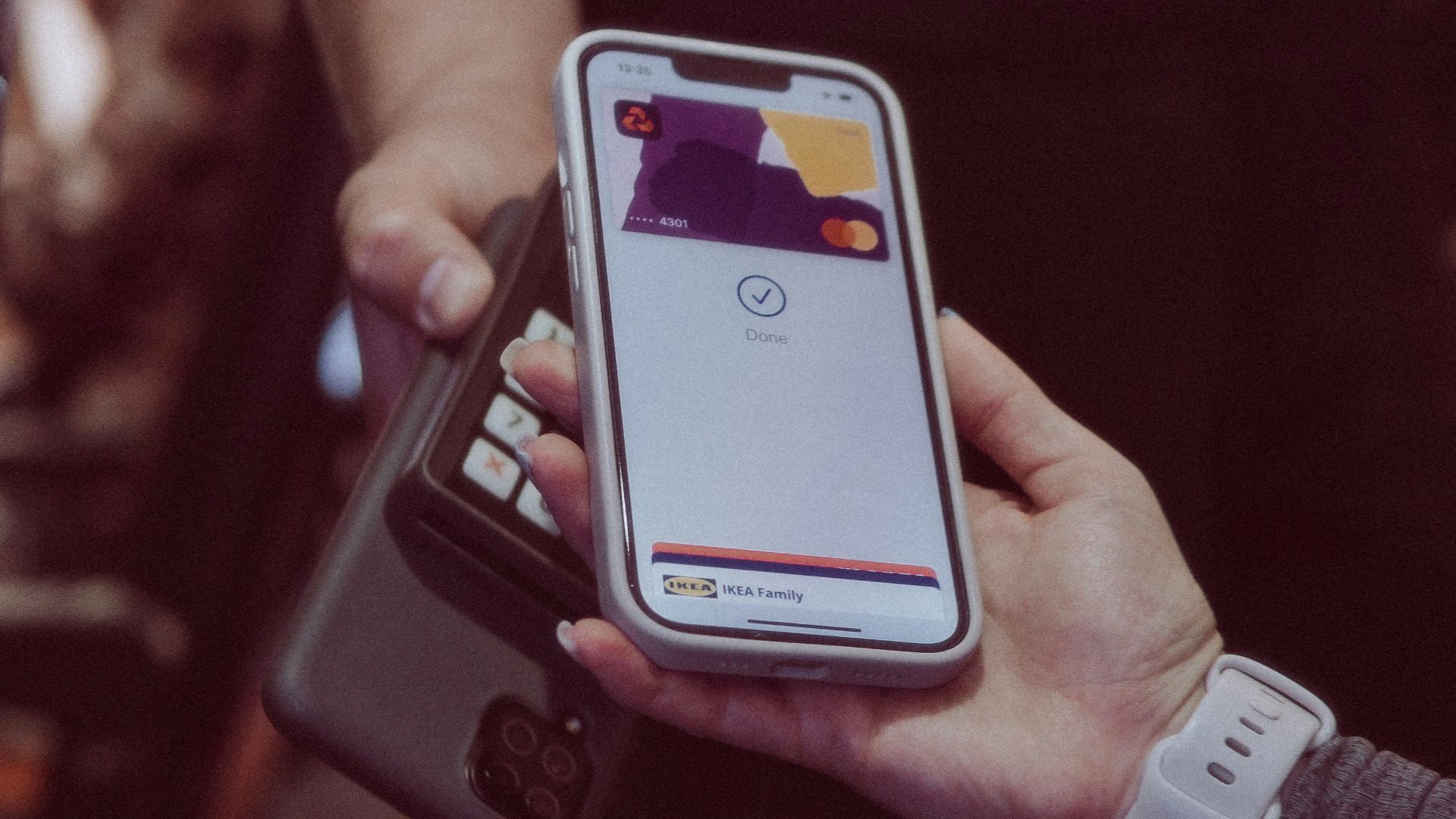 a person holds a cell phone