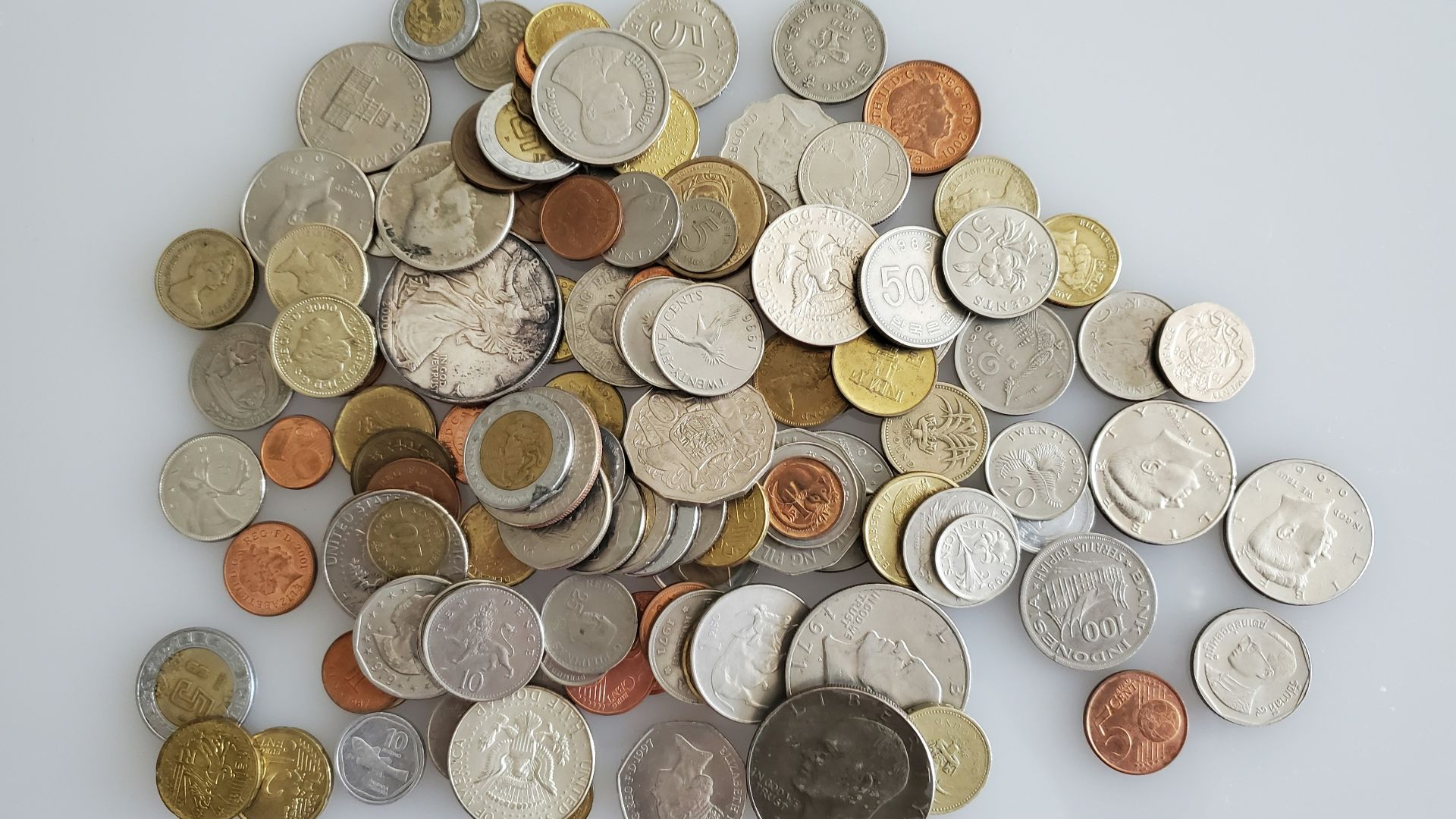silver and gold round coins