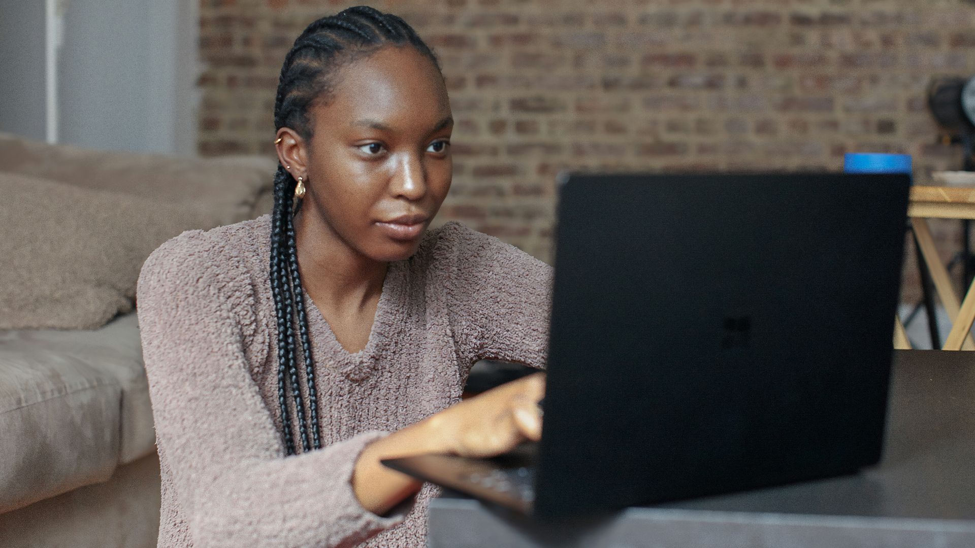 person using black Surface device