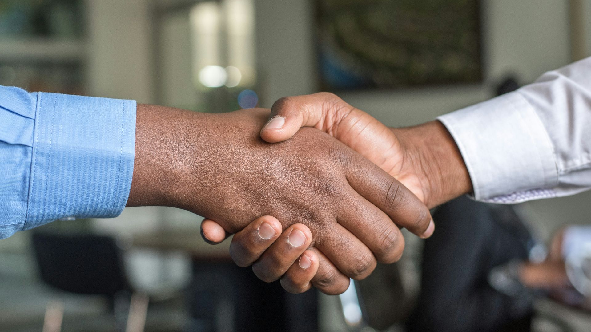 two people shaking hands