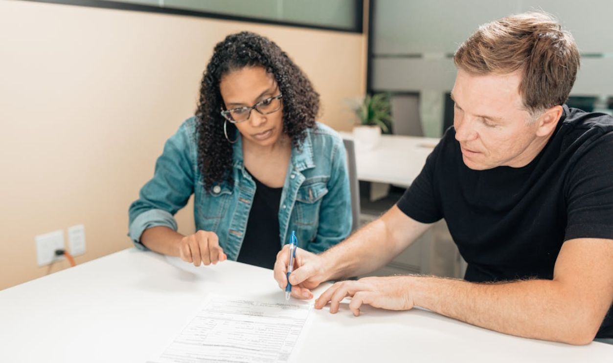 Homeowner reviewing documents thoughtfully