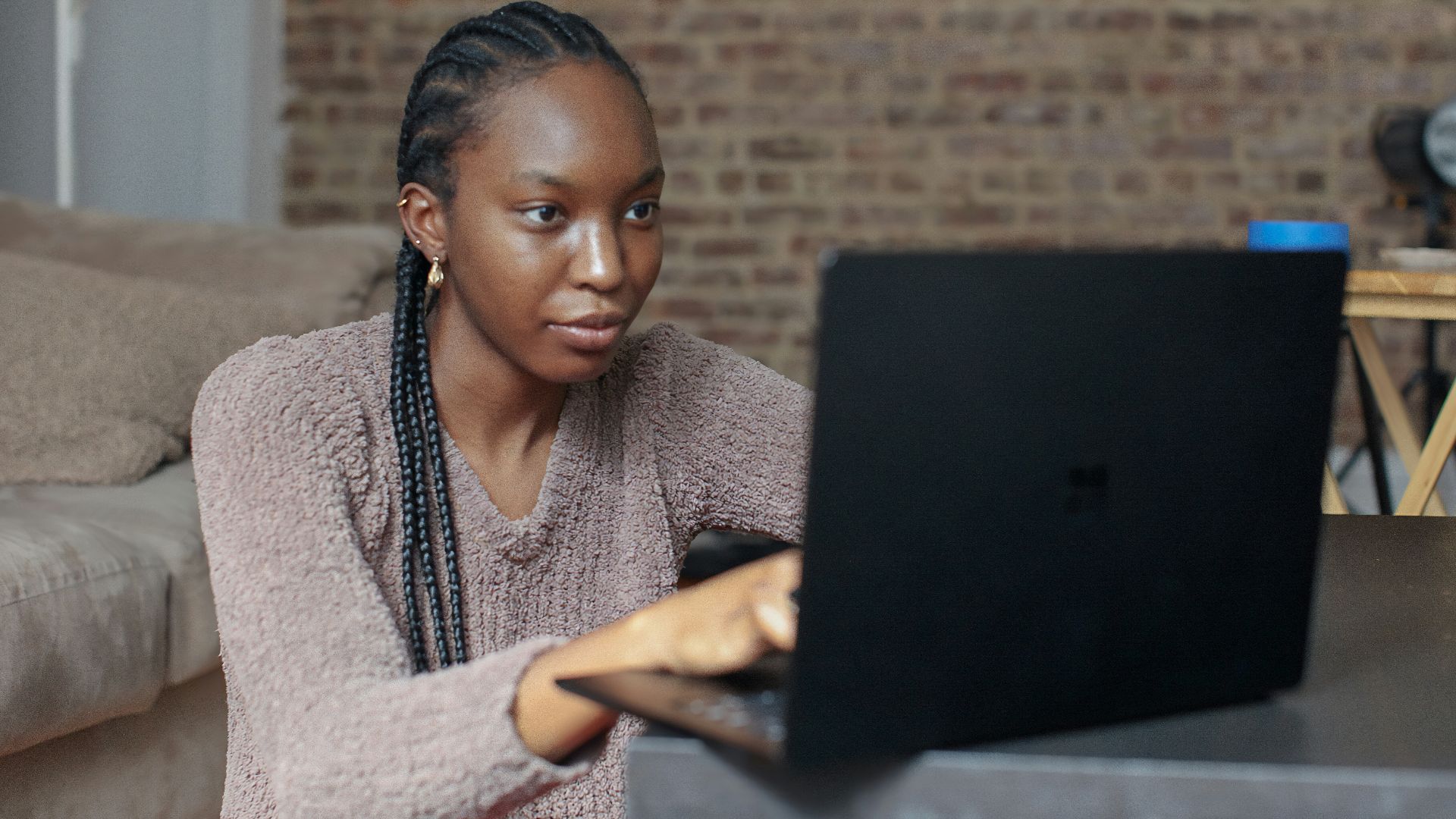 person using black Surface device