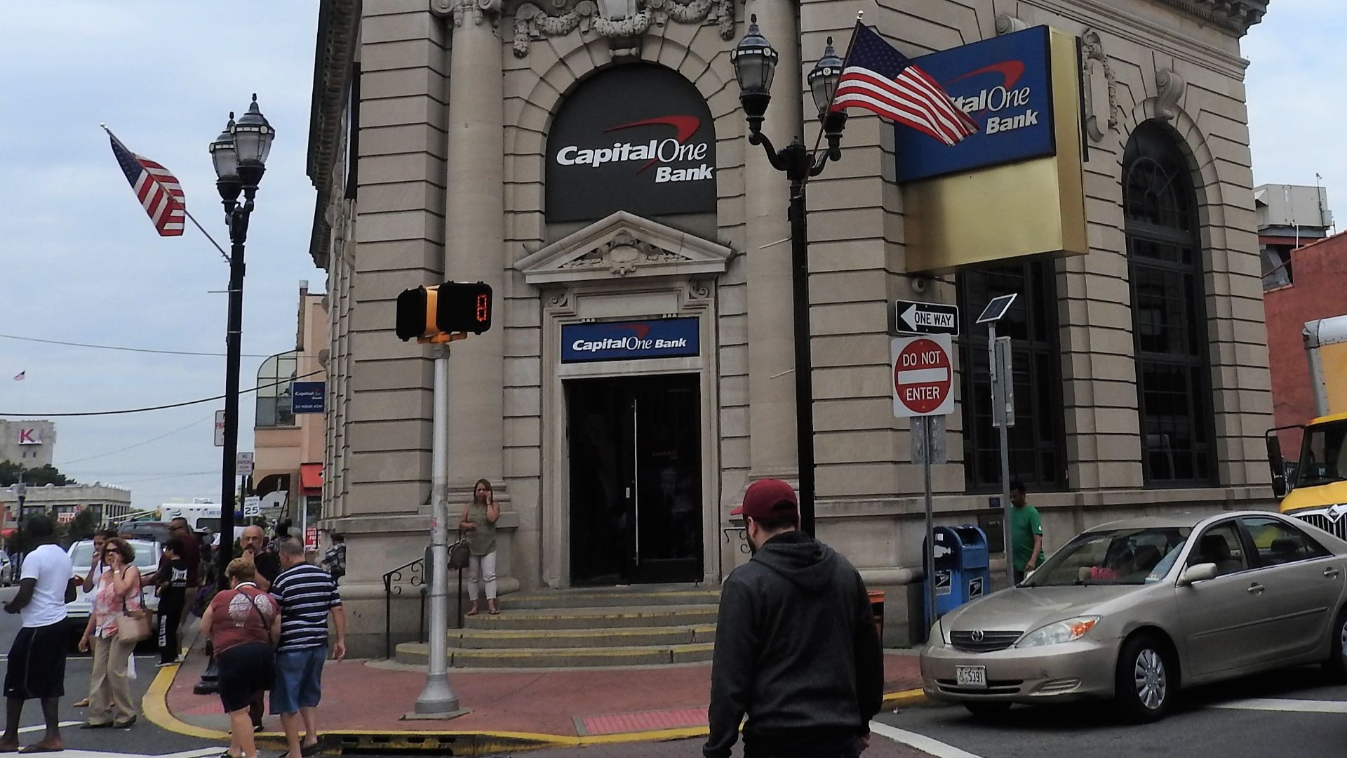 Looking north across Bergenline Avenue at bank on a cloudy day.