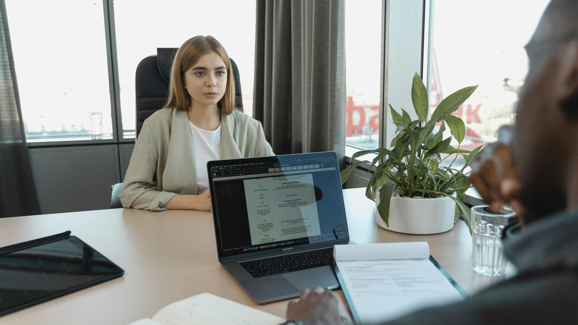 A professional job interview scene in a modern office setting, emphasizing recruitment and career opportunities.