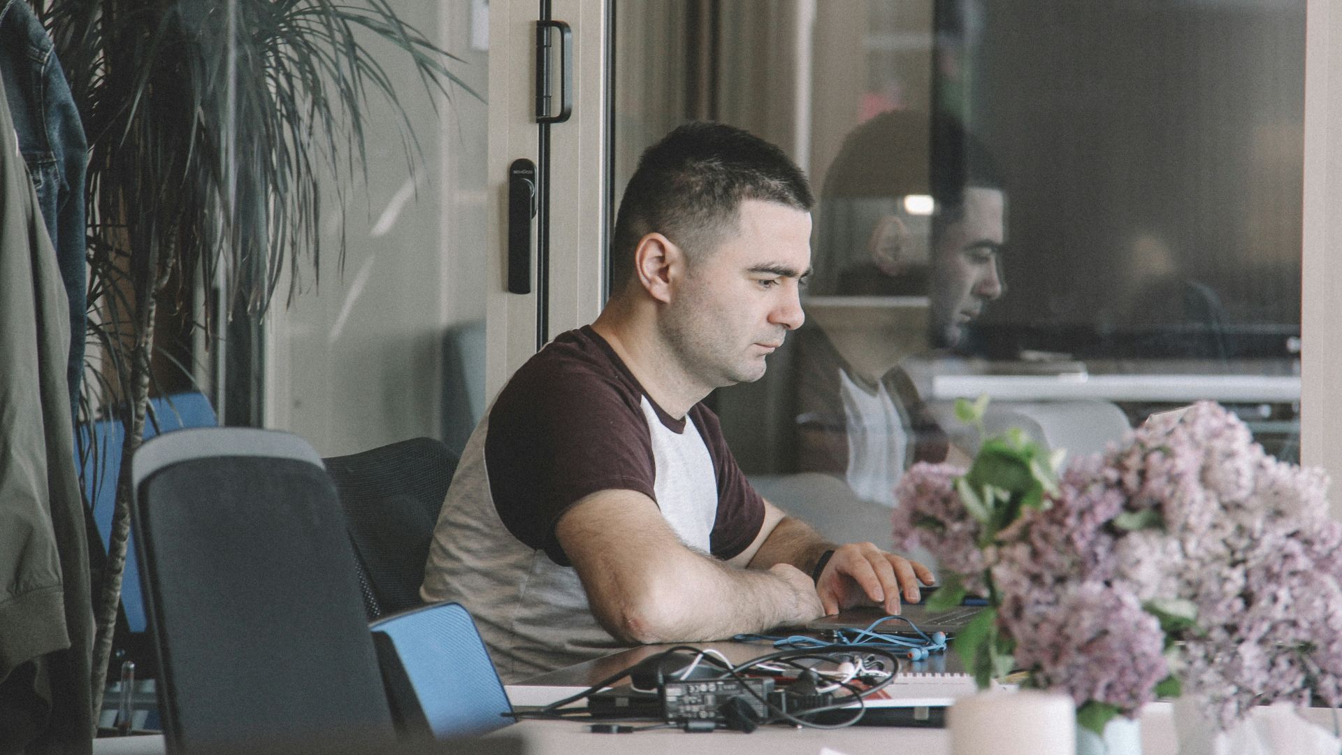 man sitting beside table