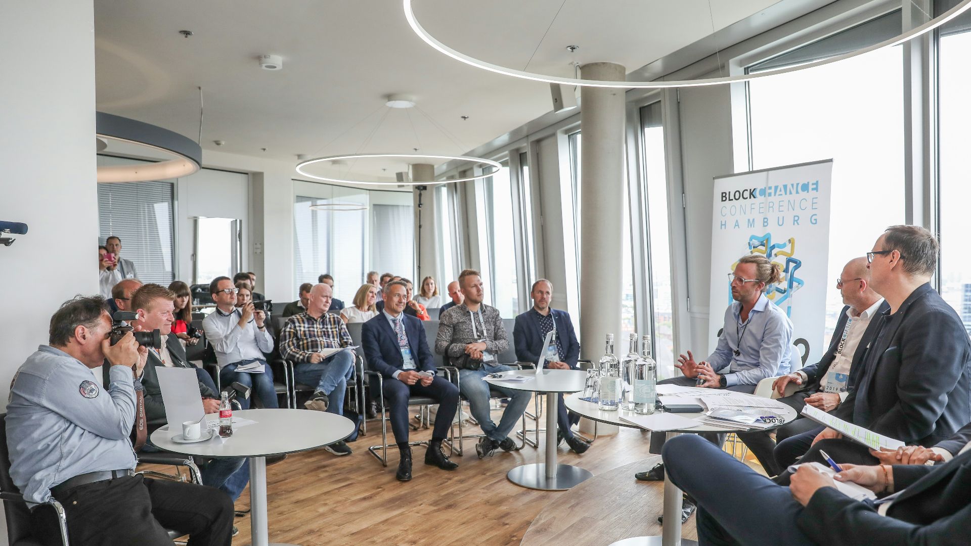 people sitting on chair in conference room