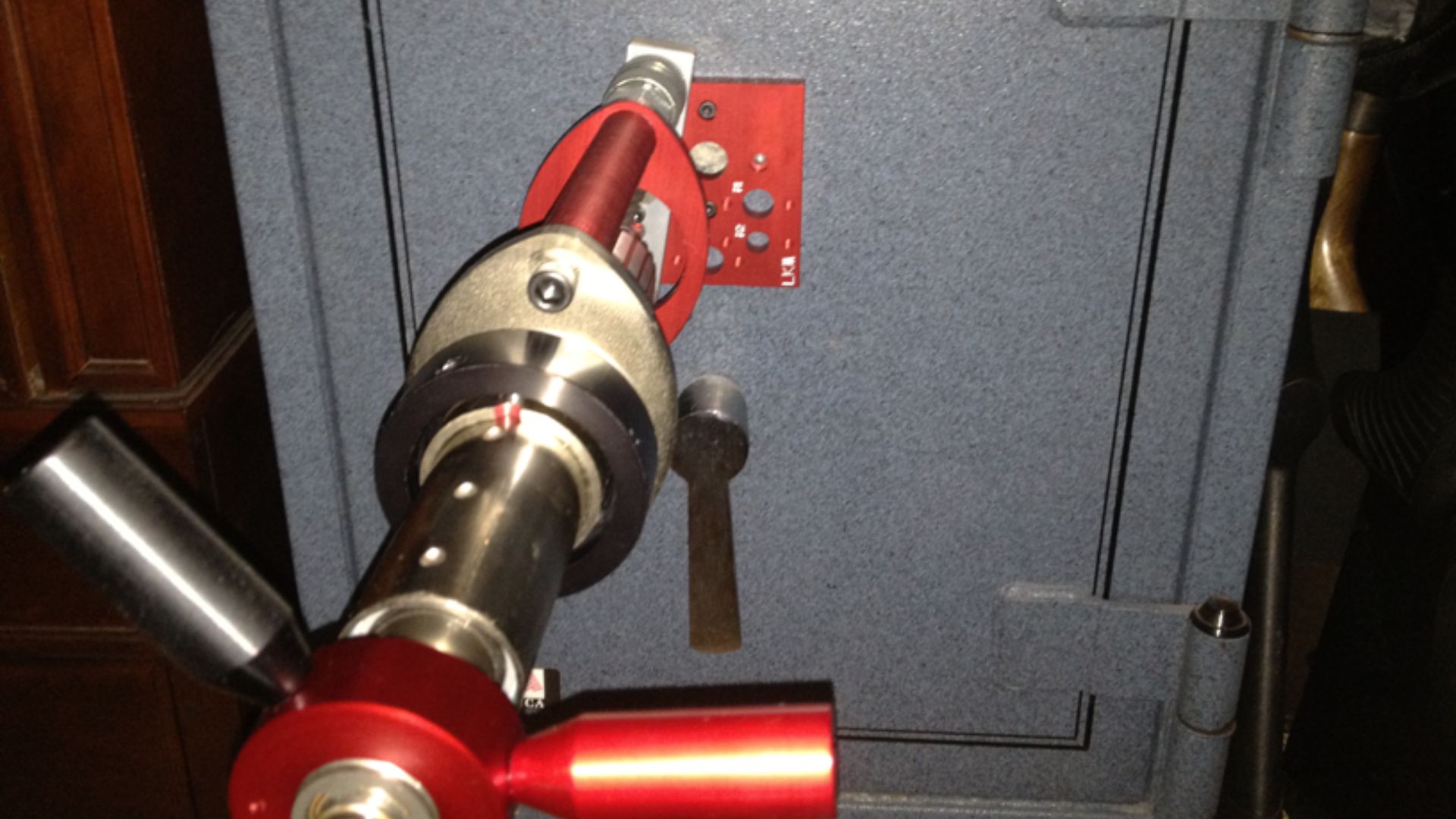 Gardall safe being cracked by Jon Lorquet of Fortress Lock, Safe, & Security using a drill method with a safe drill rig.