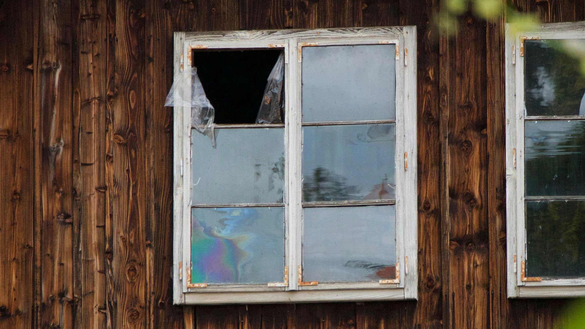 broken square white framed glass window