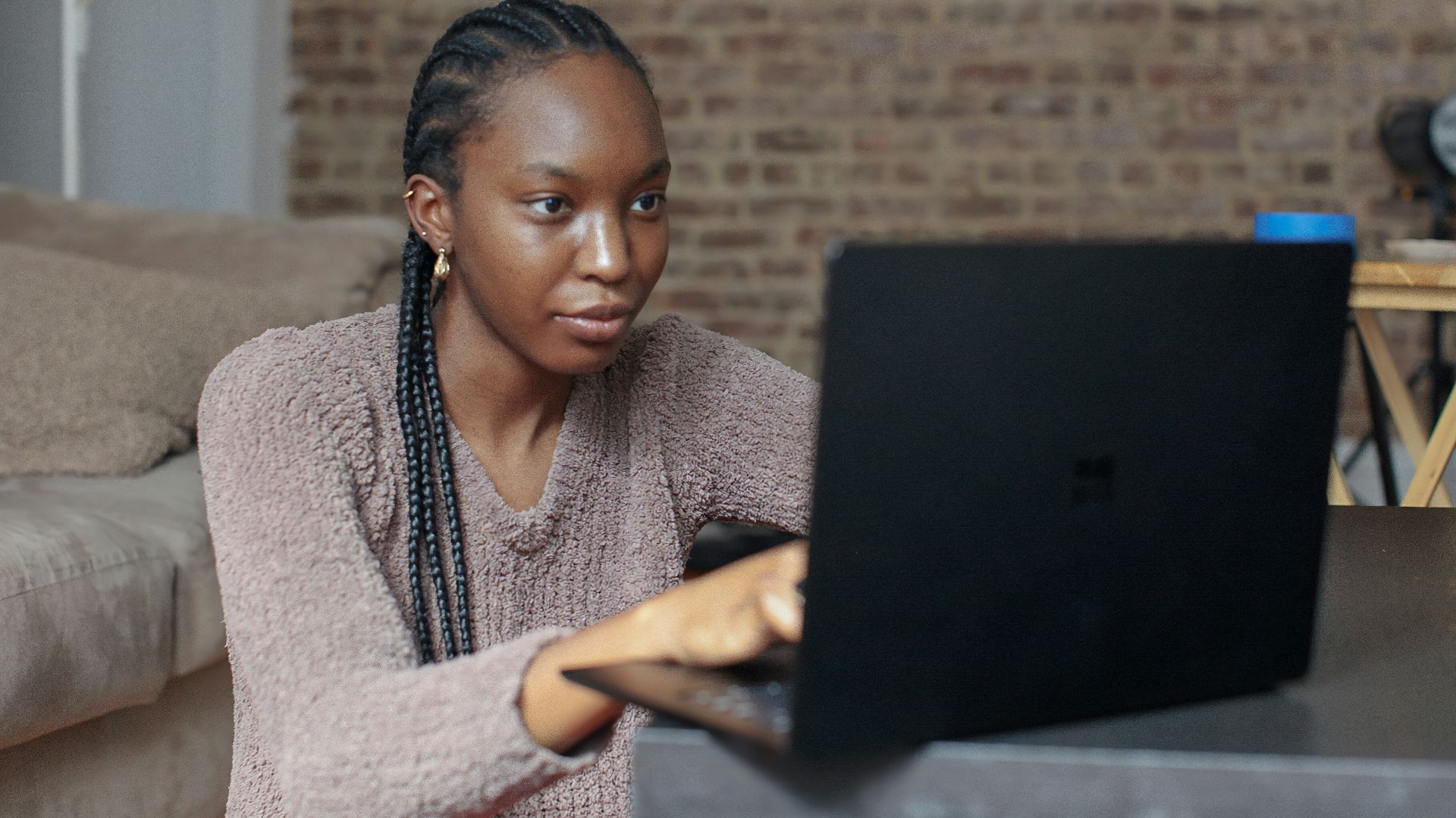 person using black Surface device