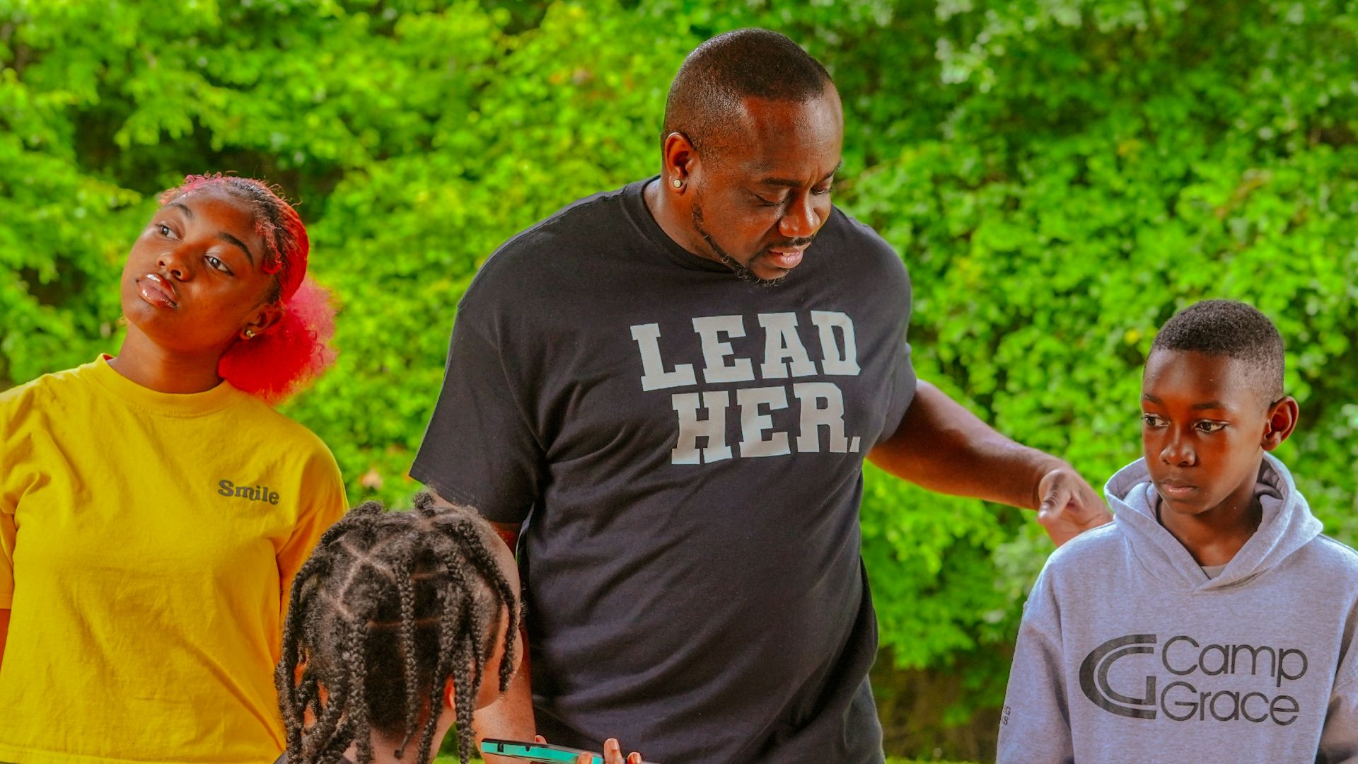 a group of people standing outside