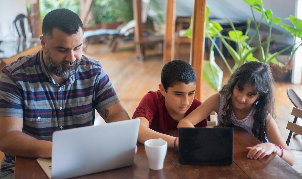A Family Sitting at the Table