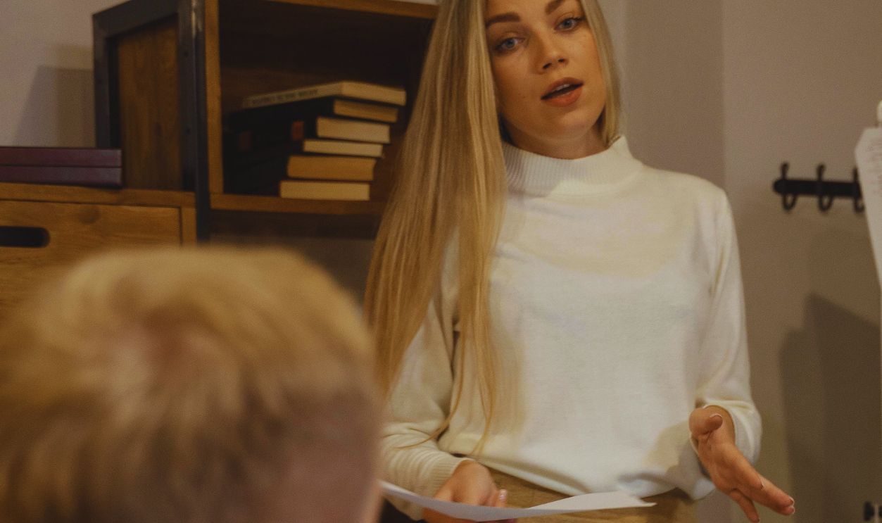 A Woman Talking in the Meeting