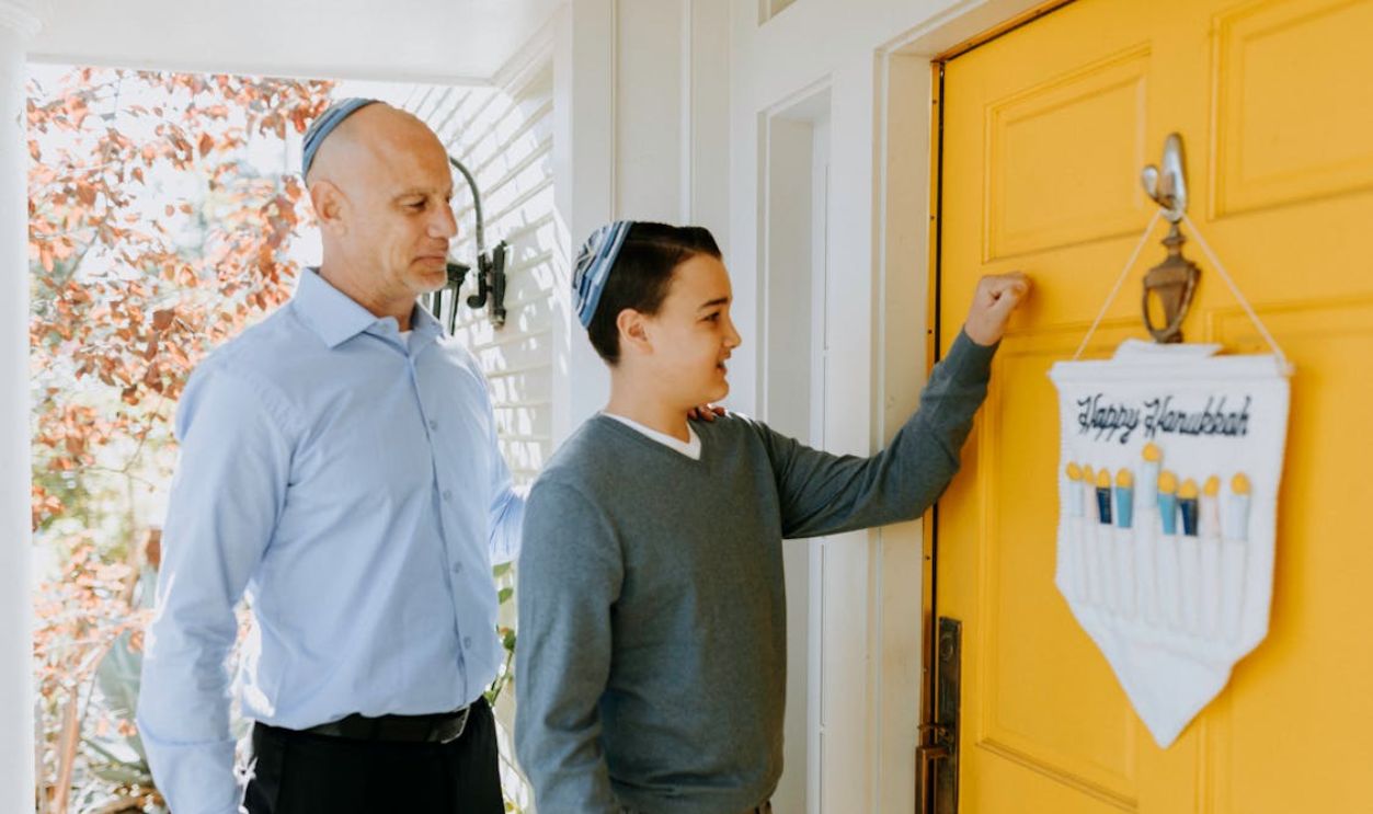 Photo Of Boy Knocking On Front Door