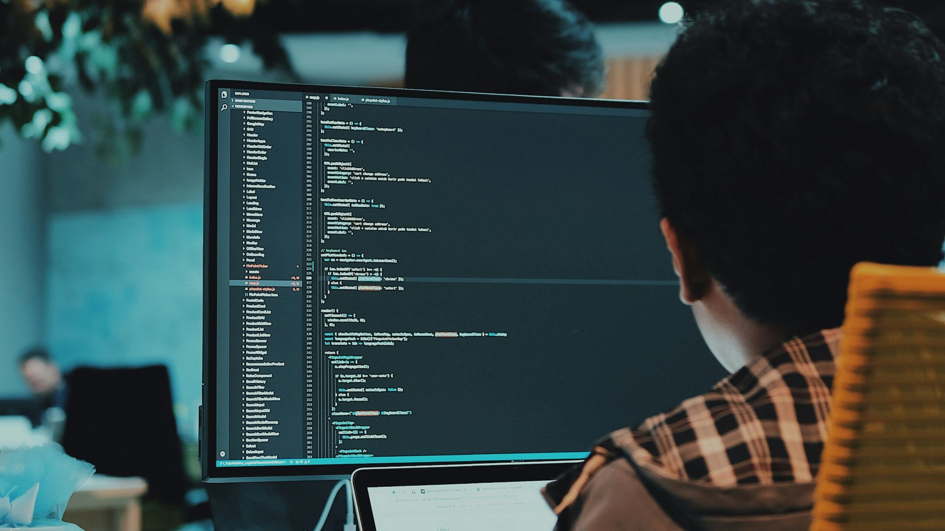 boy in front of computer monitor