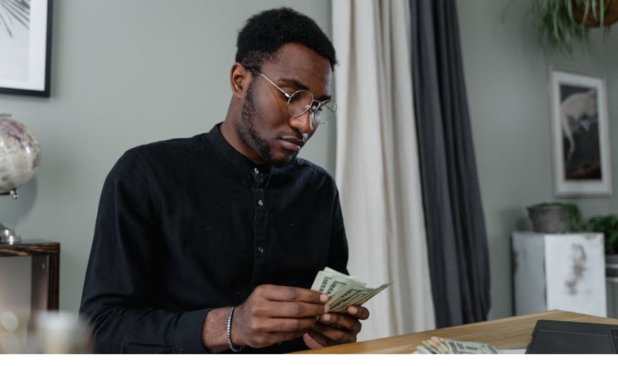 A Man Counting Money