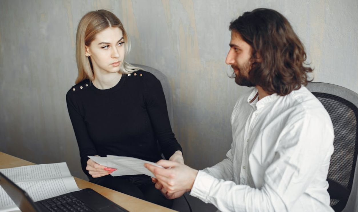 Colleagues looking at each other
