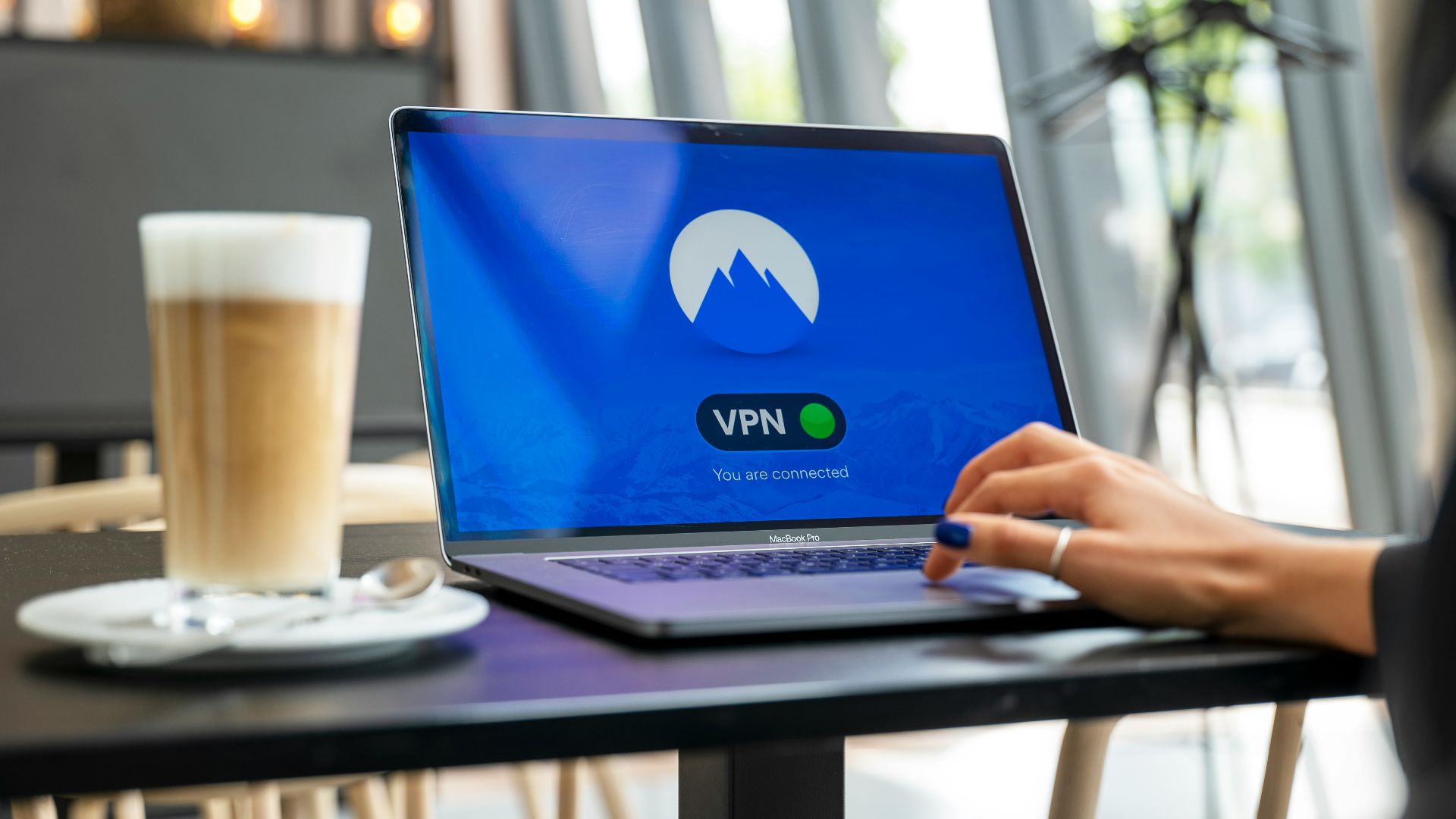 person using black laptop computer