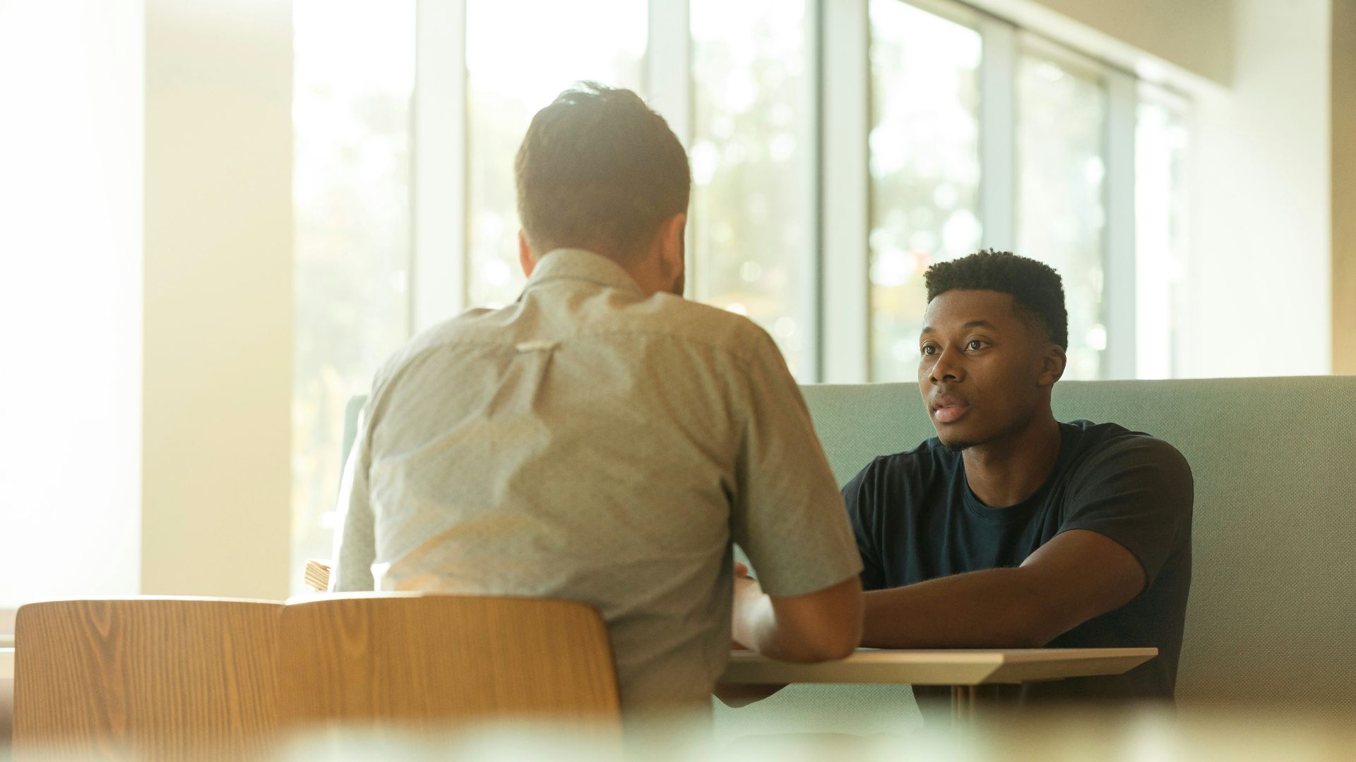 two men talking