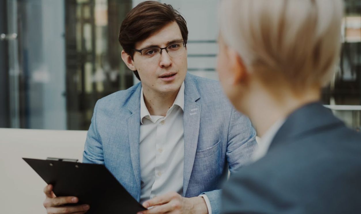 Business professionals engaged in a meeting inside a modern office setting