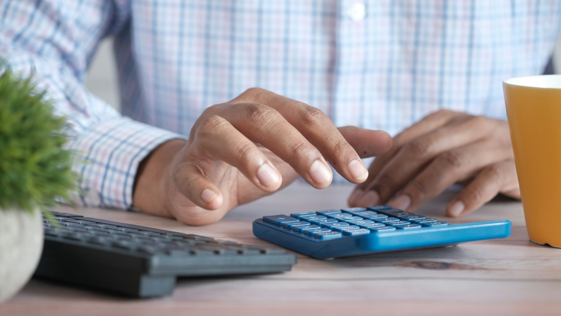 person using black computer keyboard