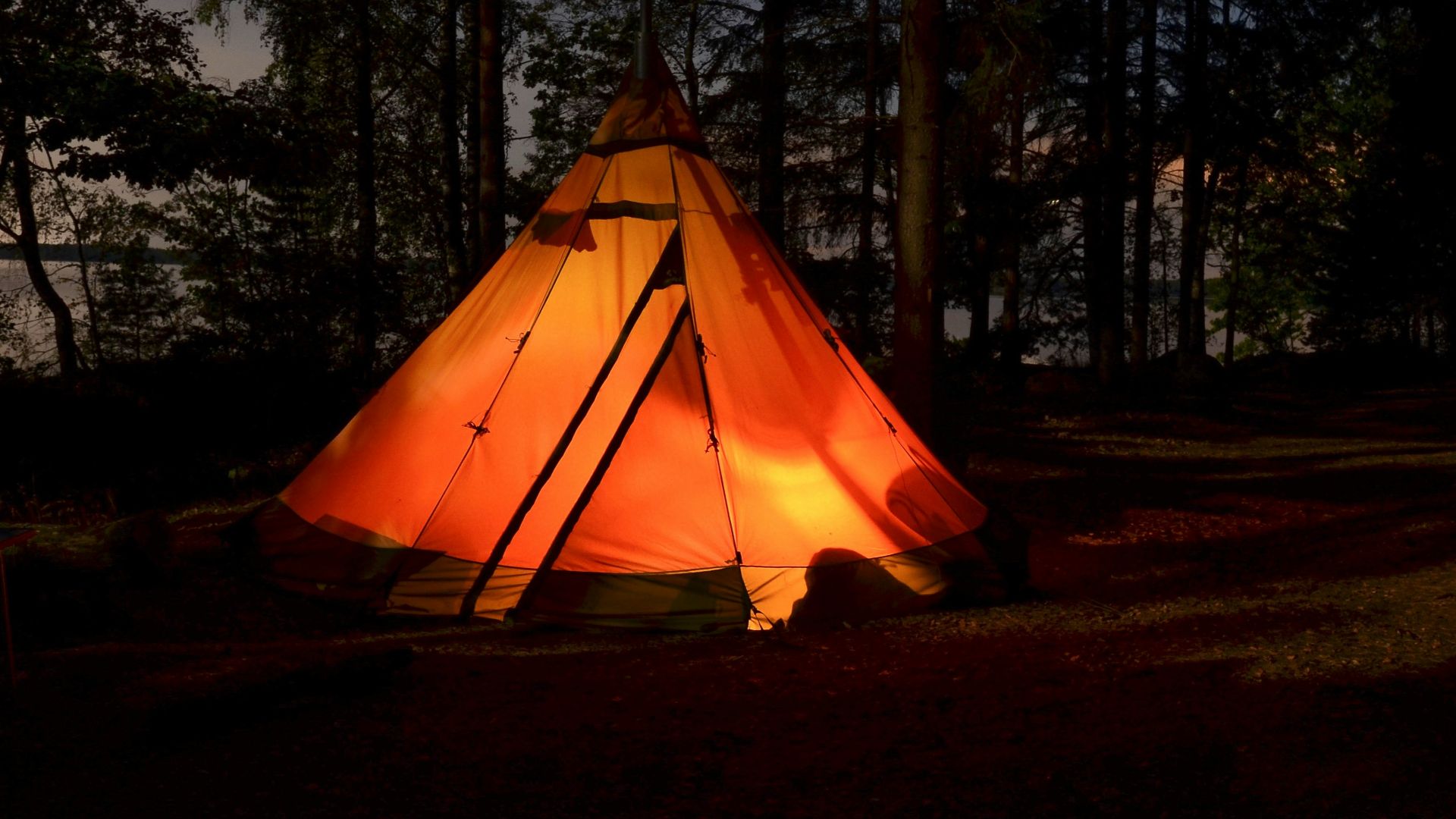 camping tent in forest during night