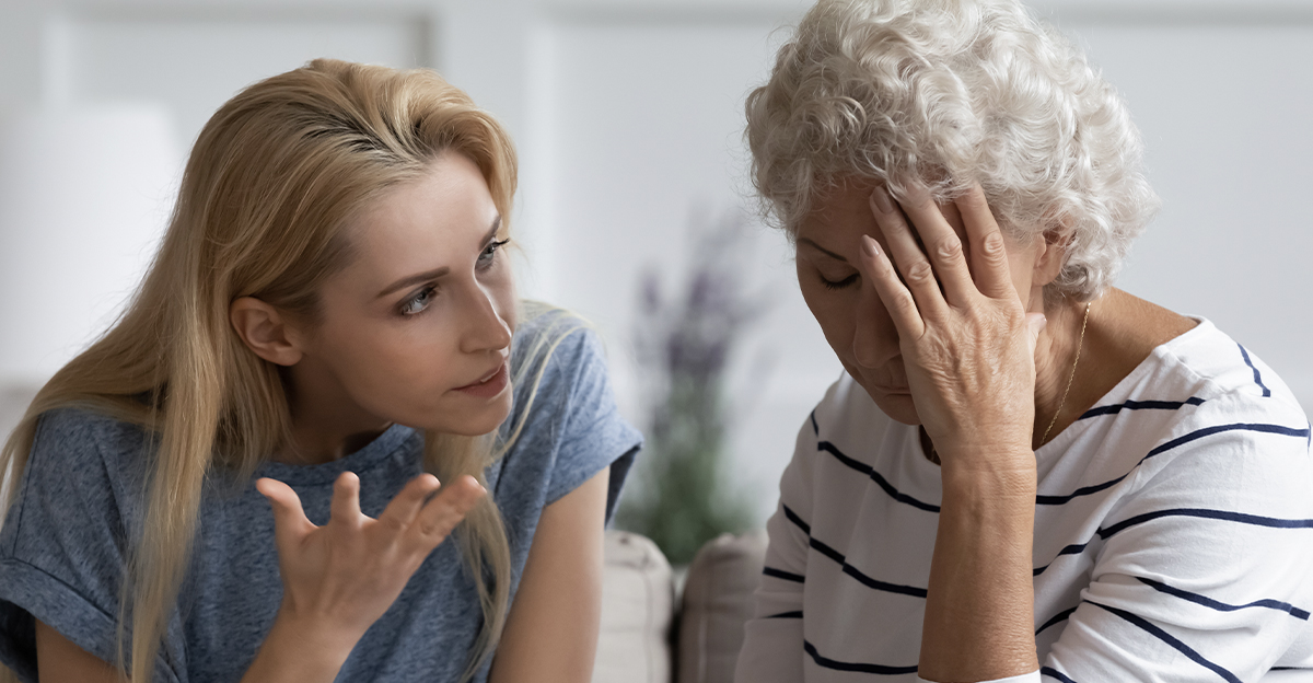 A daughter and elderly mother having an argument.