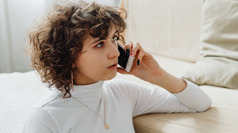 AI-generated image of a woman upset about residual interest charges.