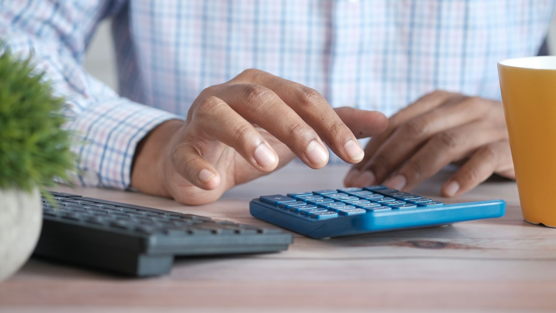 person using black computer keyboard