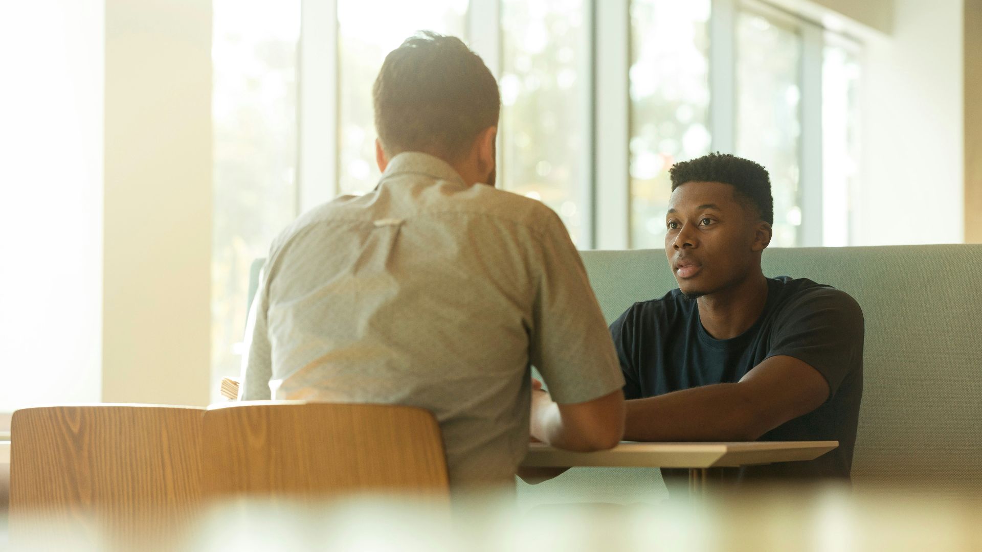 two men talking