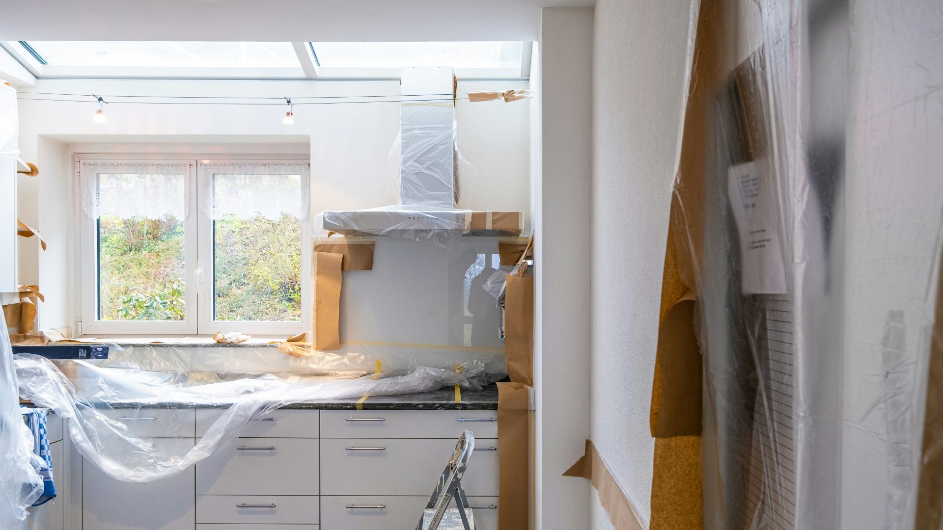 white wooden cabinet near window