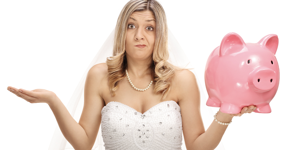 Blonde bride holding a pink piggy bank.