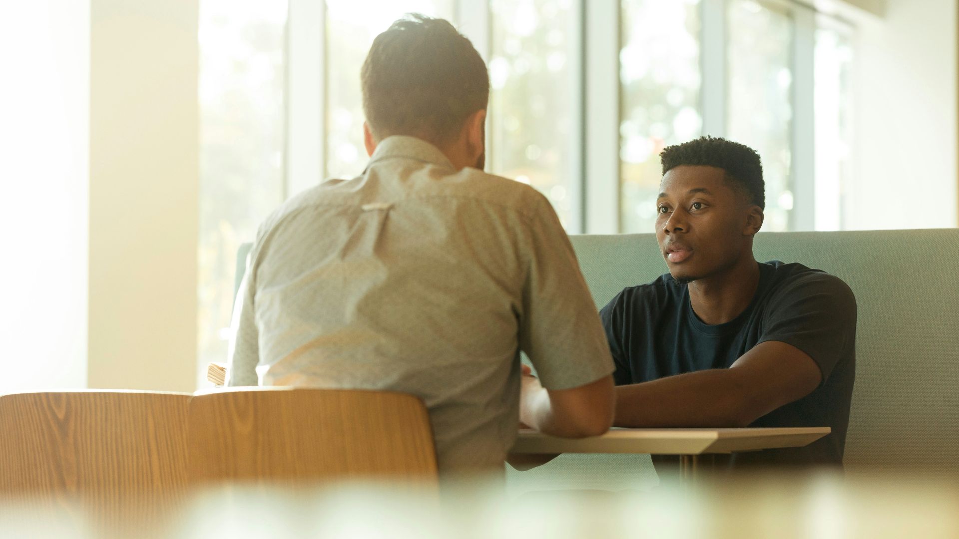 two men talking