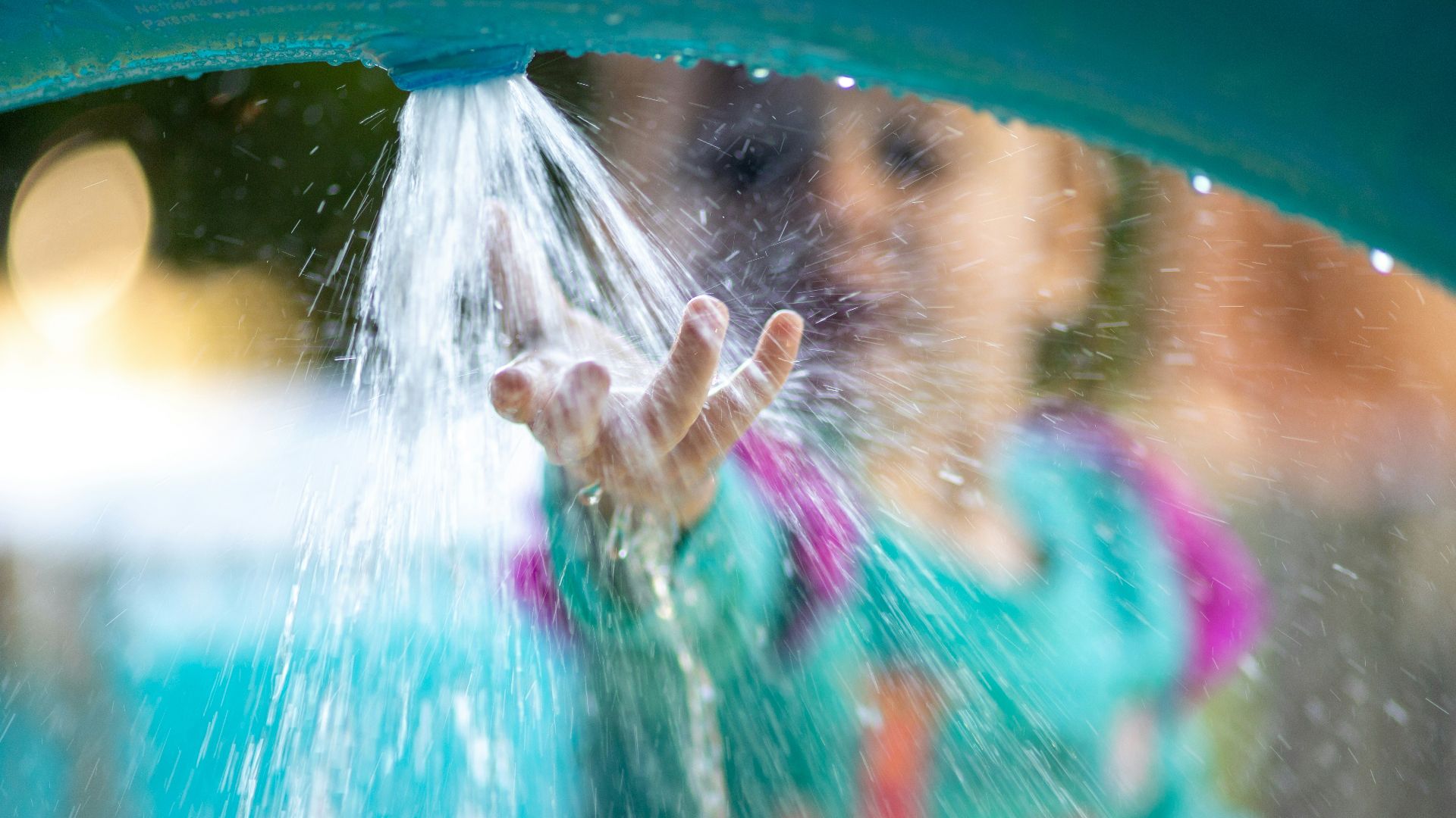 person in blue inflatable pool