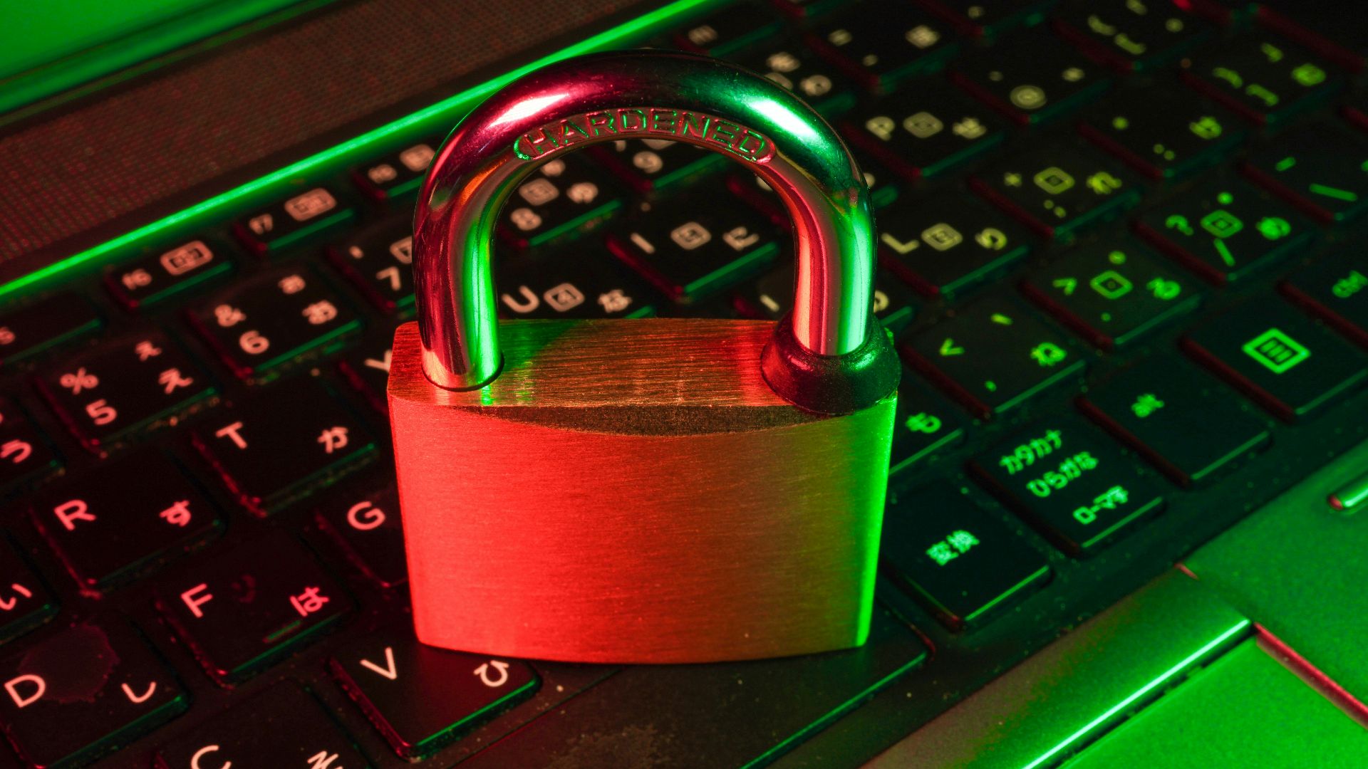 red padlock on black computer keyboard