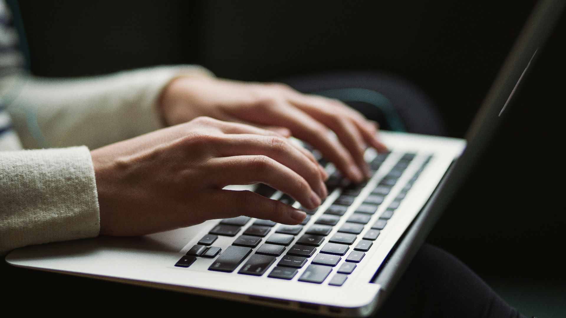 person using laptop