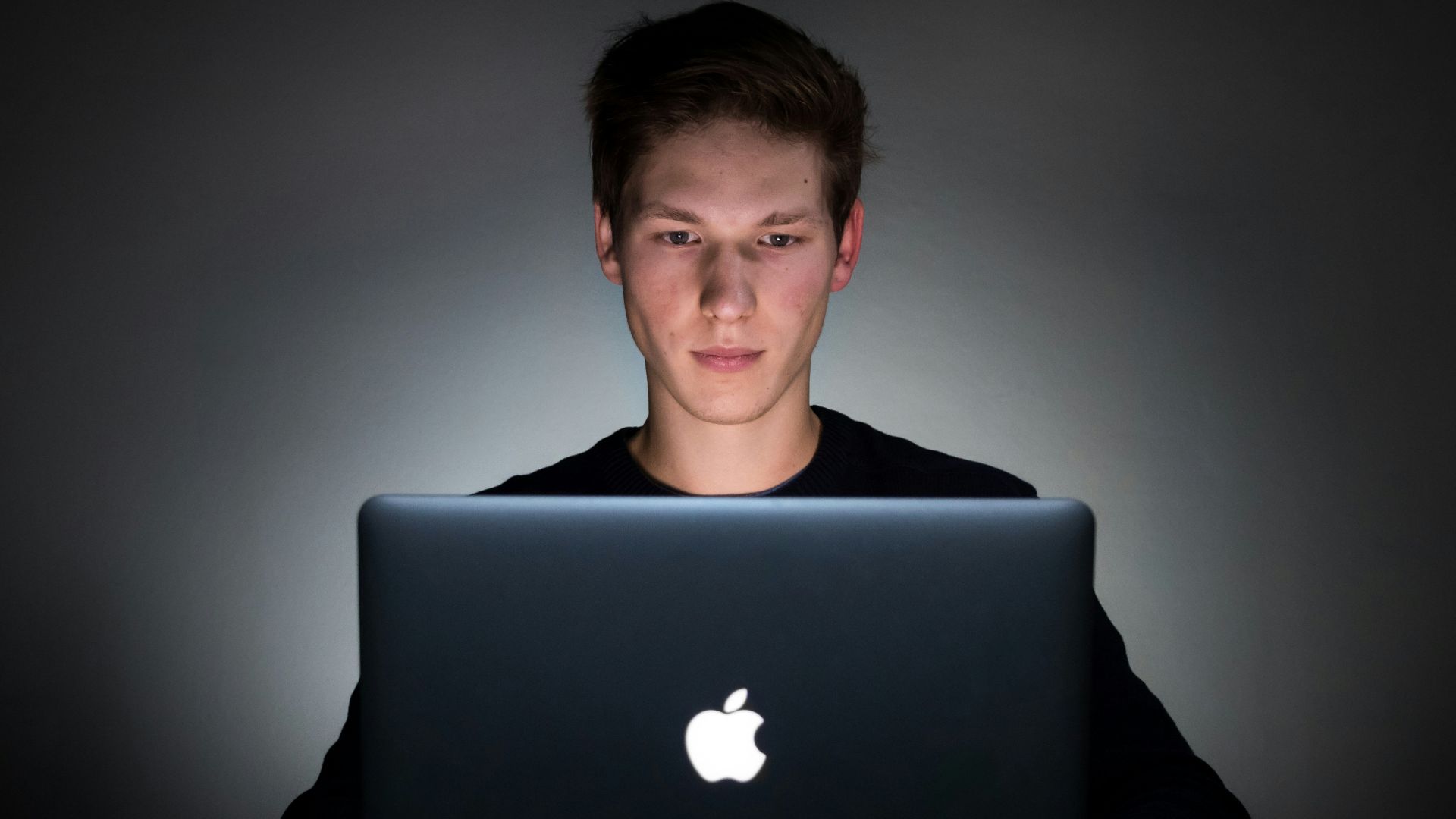 man using laptop