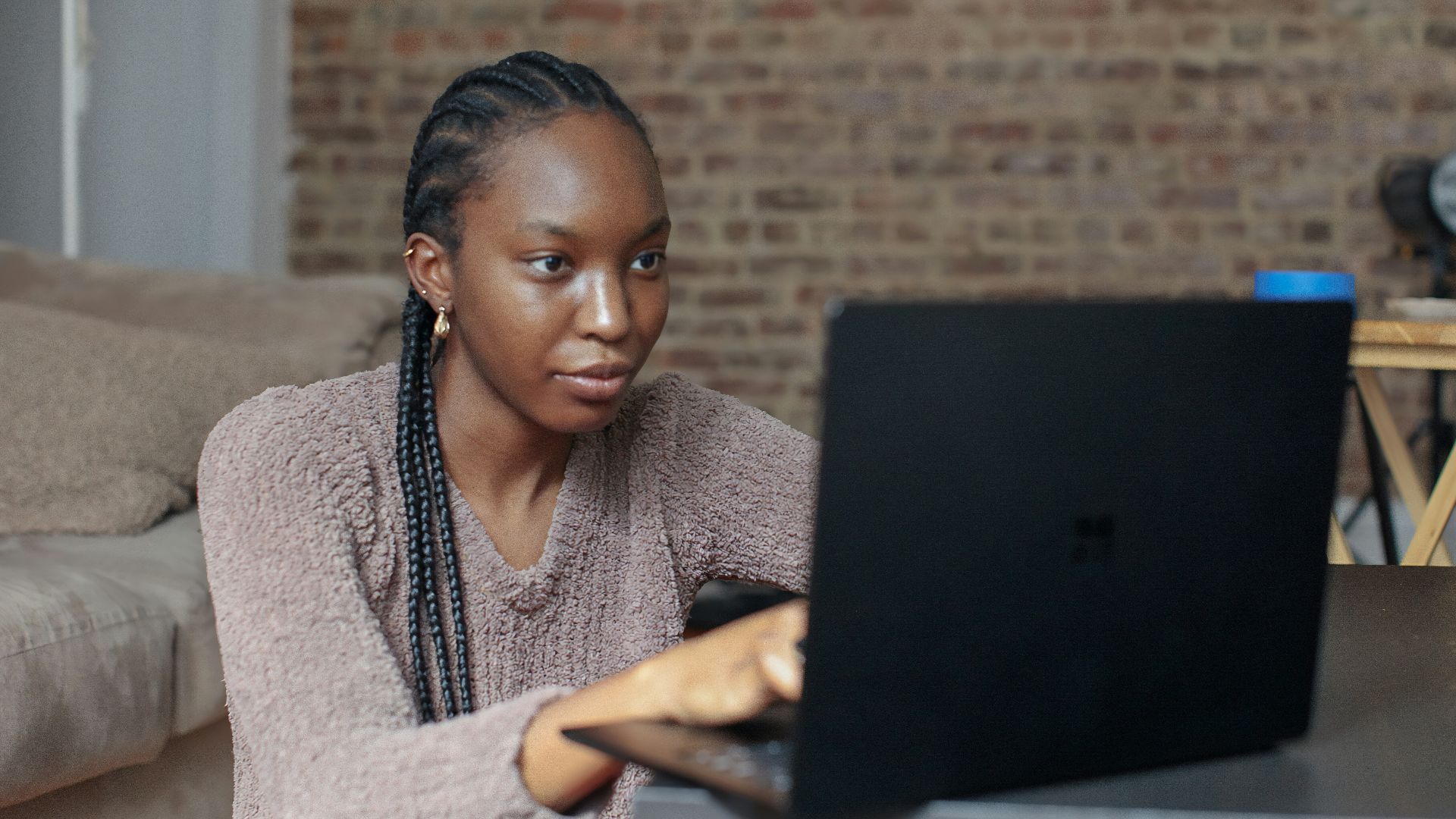 person using black Surface device