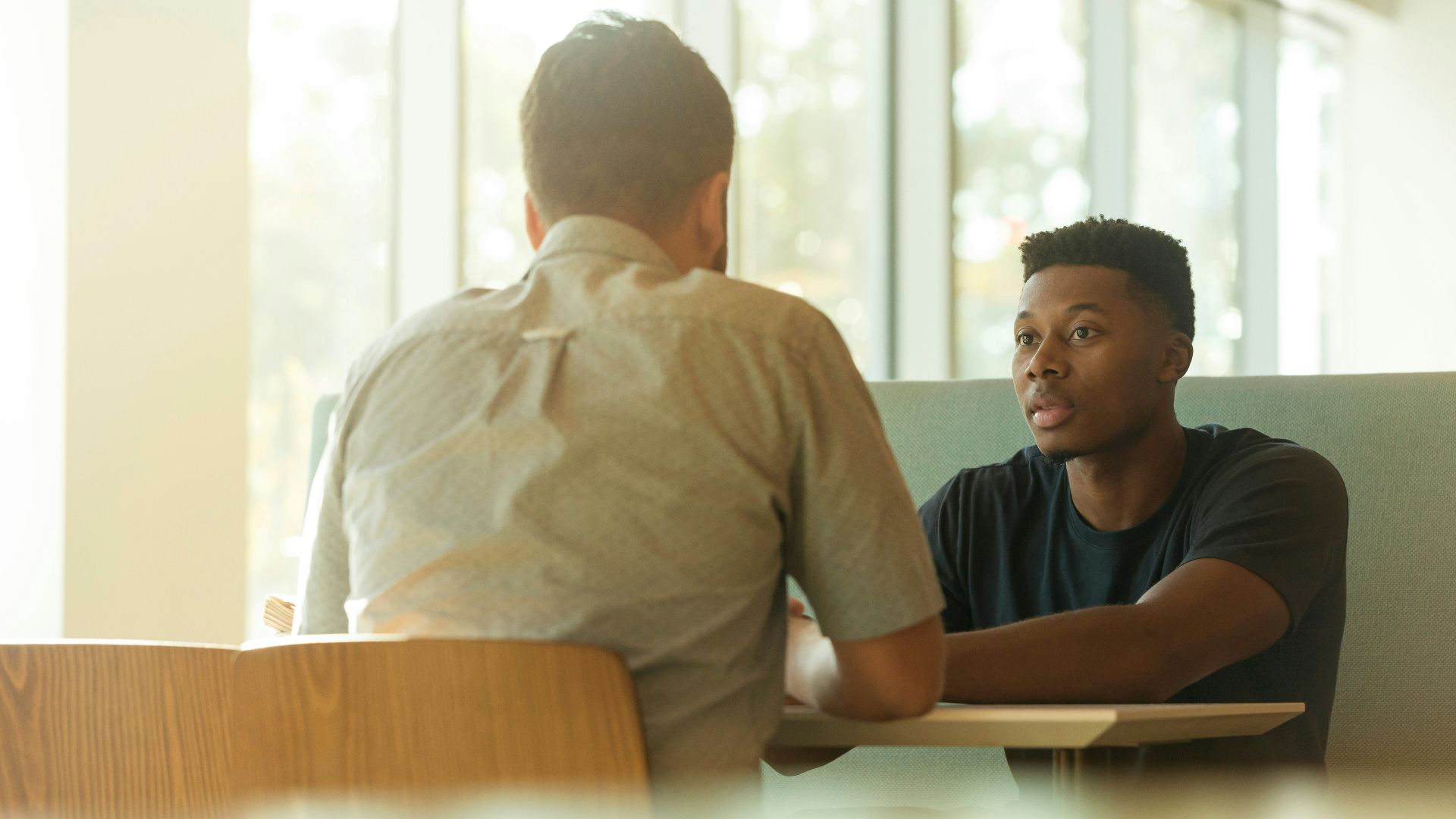 two men talking