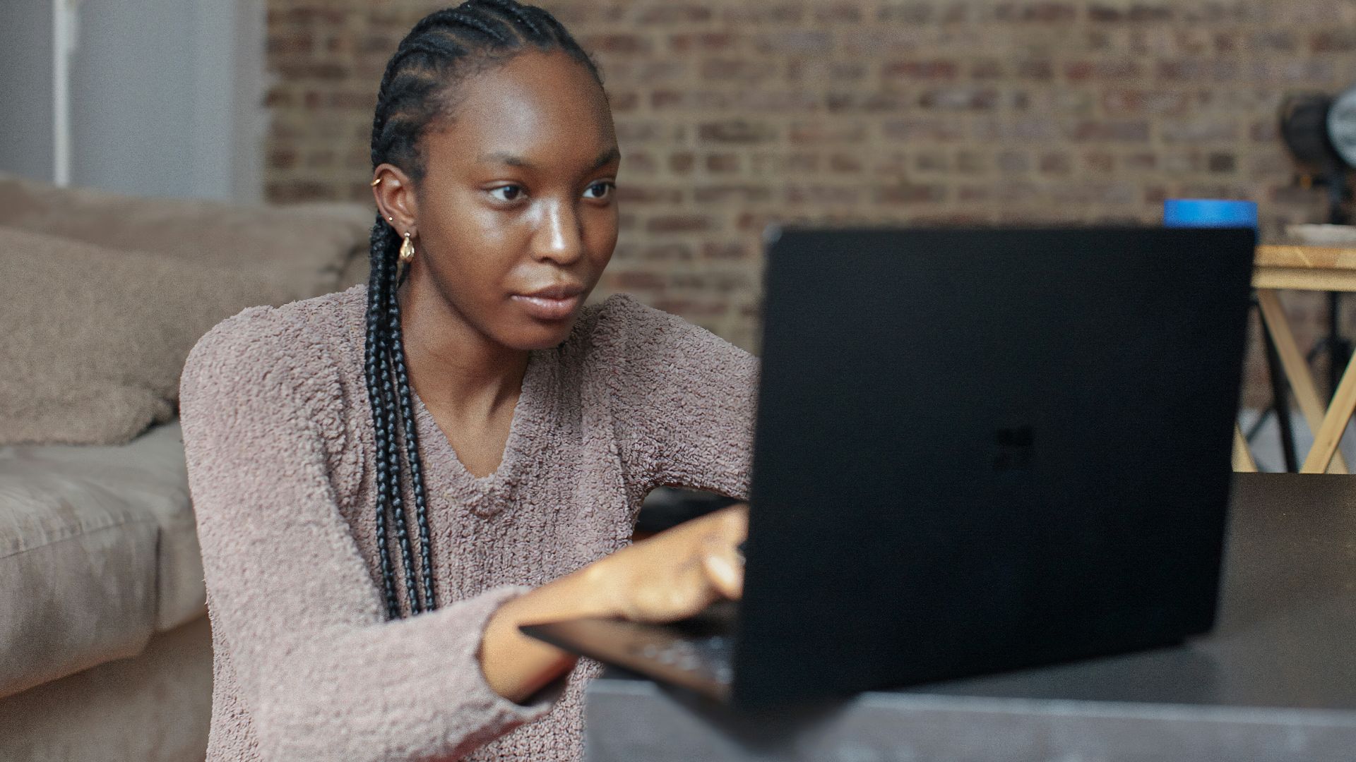 person using black Surface device