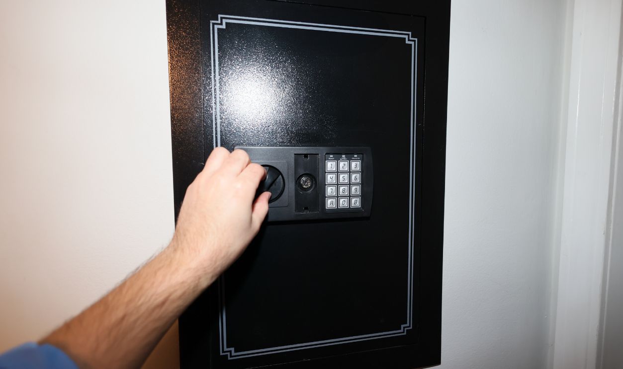 A close-up of a hidden in-wall safe discreetly installed within a wall. The sleek design emphasizes security and practicality for safeguarding valuables.