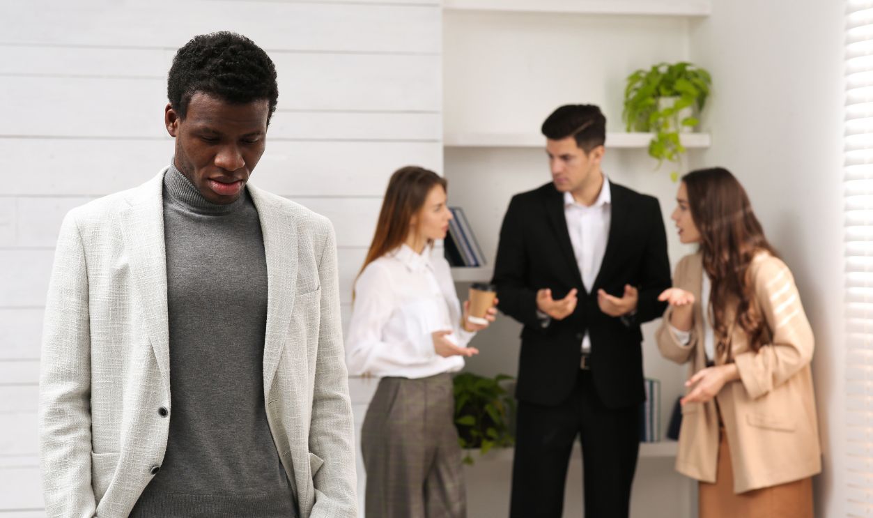 African American man suffering from racial discrimination at work