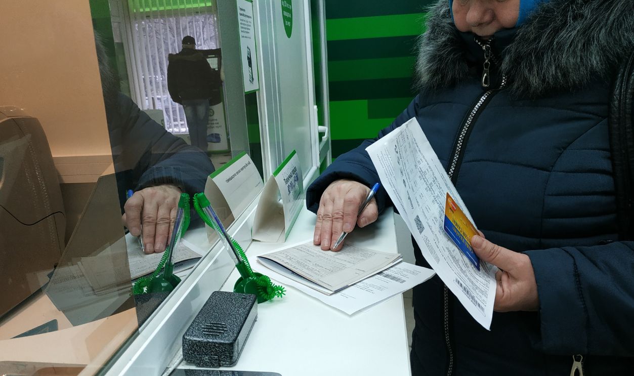 Kiev, Ukraine - November 23, 2018: Queue at the national bank PrivatBank in the city center. Payment of utility services.